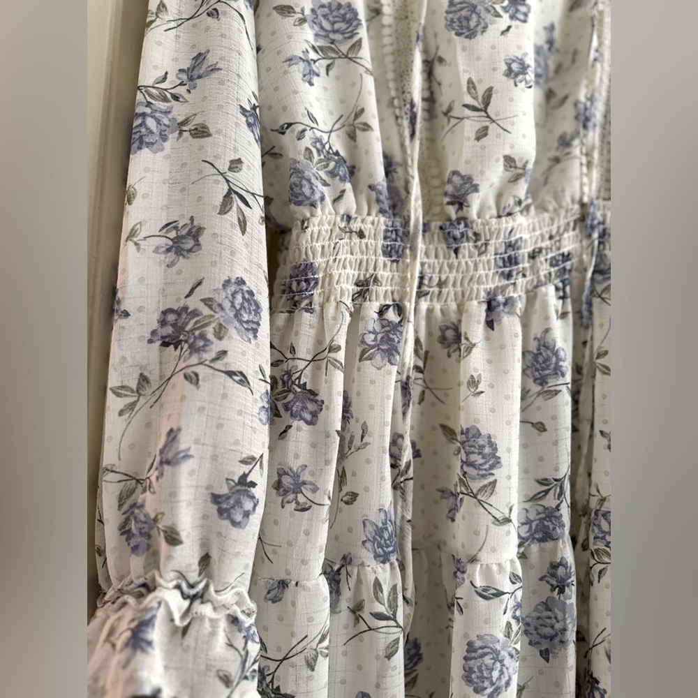 Elegant floral long sleeve dress.